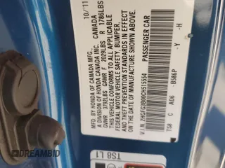2012 Honda Civic Cpe EX-L with VIN 2HGFG3B00CH515554, listed as a Copart auction lot 52115715 with 136,309 mi miles and Salvage Title. Bid and sale history available at carsss.com. Image 14.