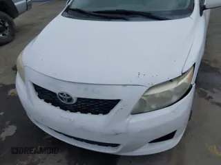 2009 Toyota Corolla with VIN 1NXBU40E99Z082845, listed as a IAAI auction lot 42046564 with 180,910 mi miles. Bid and sale history available at carsss.com. Image 6.