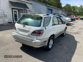 2003 Lexus RX 300 z VIN JTJHF10U330298457, wystawiony jako Copart lot #58005605 z przebiegiem 232 639 mil mil oraz Czysty tytuł • Clean title. Historia ofert i sprzedaży dostępna na DreamBid. Obrazek 4.