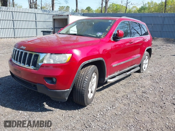 2011 Jeep Grand Cherokee Laredo with VIN 1J4RR4GG5BC512095, listed as a IAAI auction lot 42156490 with 160,749 mi miles. Bid and sale history available at carsss.com. Image 2.