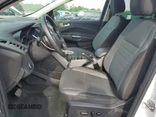 2016 Ford Escape SE z VIN 1FMCU9G97GUB45352, wystawiony jako Copart lot #60001055 z przebiegiem 93 685 mil mil oraz Szkoda całkowita • Salvage title. Historia ofert i sprzedaży dostępna na DreamBid. Obrazek 7.