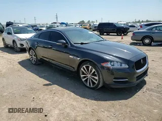 2013 Jaguar XJ with VIN SAJWA3HE9DMV49768, listed as a Copart auction lot 50339955 with 56,841 mi miles and Salvage Title. Bid and sale history available at DreamBid. Image 10.