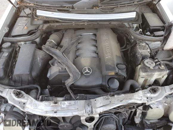 2000 Mercedes-Benz E-Class with VIN WDBJF70JXYB113988, listed as a Copart auction lot 86325514 with 198,321 mi miles and Salvage Title. Bid and sale history available at carsss.com. Image 13.