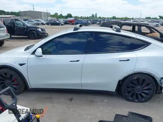 2021 Tesla Model Y Performance with VIN 5YJYGDEF9MF081798, listed as a IAAI auction lot 42033358 with 64,679 mi miles and . Bid and sale history available at DreamBid. Image 15.