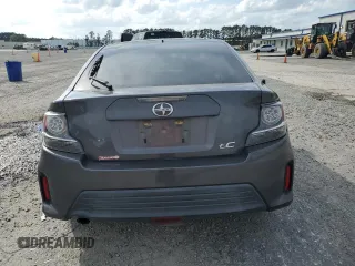 2016 Scion tC z VIN JTKJF5C78GJ019806, wystawiony jako Copart lot #51933685 z przebiegiem 152 395 mil mil oraz Szkody całkowita. Historia ofert i sprzedaży dostępna na DreamBid. Obrazek 6.