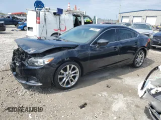 2014 Mazda 6 i Grand Touring with VIN JM1GJ1W64E1119006, listed as a Copart auction lot 68558844 with 200,652 mi miles and Salvage Title. Bid and sale history available at carsss.com. Image 1.