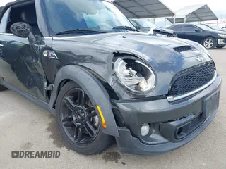 2012 MINI Convertible S with VIN WMWZP3C54CT250689, listed as a IAAI auction lot 41928624 with 126,442 mi miles and . Bid and sale history available at DreamBid. Image 13.