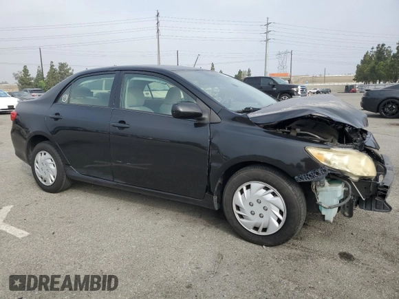 2010 Toyota Corolla with VIN JTDBU4EE3A9123331, listed as a Copart auction lot 60869295 with 185,744 mi miles and Salvage title. Bid and sale history available at DreamBid. Image 4.