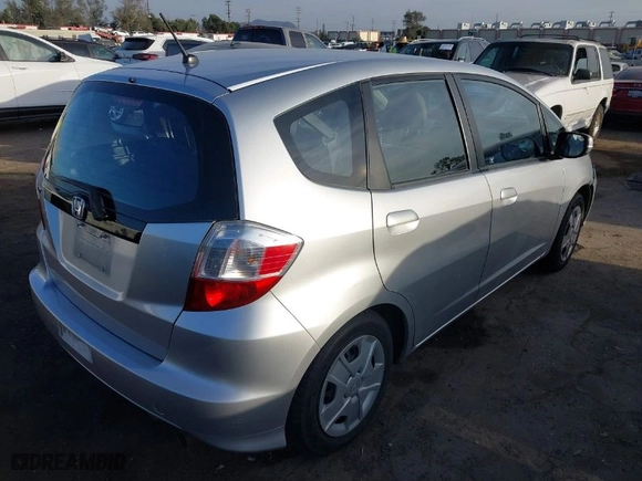 2013 Honda Fit with VIN JHMGE8H3XDC002189, listed as a IAAI auction lot 41730846 with 63,073 mi miles. Bid and sale history available at carsss.com. Image 4.