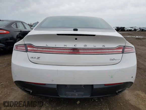 2014 Lincoln MKZ z VIN 3LN6L2G93ER811683, wystawiony jako Copart lot #52004485 z przebiegiem 188 134 mil mil oraz Szkoda całkowita • Salvage title. Historia ofert i sprzedaży dostępna na DreamBid. Obrazek 6.