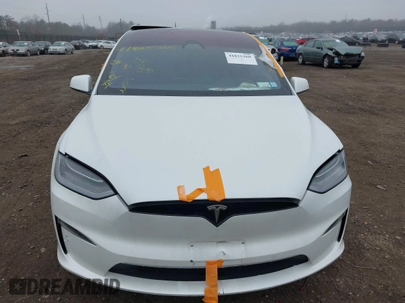 2022 Tesla Model X Plaid z VIN 7SAXCBE67NF339557, wystawiony jako IAAI lot #41825360 z przebiegiem 70 mil mil oraz . Historia ofert i sprzedaży dostępna na DreamBid. Obrazek 12.