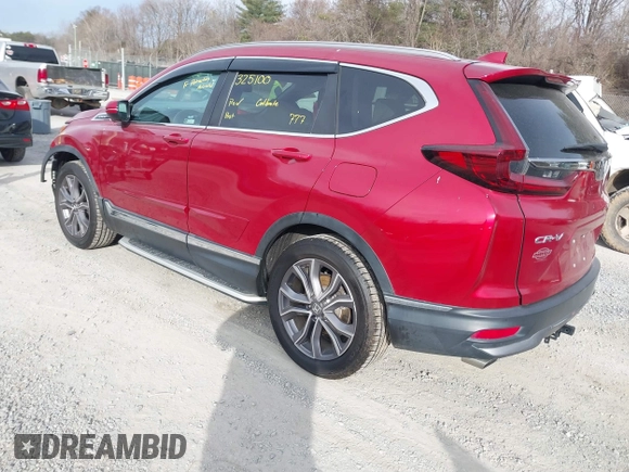 2020 Honda CR-V Touring with VIN 2HKRW2H90LH649017, listed as a IAAI auction lot 41701827 with 50,565 mi miles and . Bid and sale history available at DreamBid. Image 3.