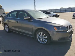 2014 Volkswagen Jetta SE with VIN 3VWD07AJXEM315231, listed as a Copart auction lot 58258075 with 99,860 mi miles and Salvage title. Bid and sale history available at DreamBid. Image 4.