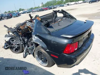 2002 Ford Mustang GT Deluxe with VIN 1FAFP42X52F185384, listed as a IAAI auction lot 42475600 with Not provided miles and . Bid and sale history available at DreamBid. Image 3.
