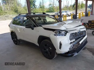 2020 Toyota RAV4 Hybrid XSE with VIN JTMEWRFV4LD541173, listed as a IAAI auction lot 42666059 with 28,768 mi miles and . Bid and sale history available at DreamBid. Image 1.