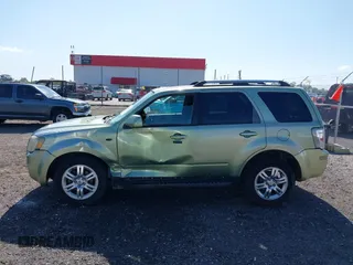 2008 Mercury Mariner Premier z VIN 4M2CU87128KJ17796, wystawiony jako IAAI lot #42296965 z przebiegiem 273 153 mil mil oraz . Historia ofert i sprzedaży dostępna na DreamBid. Obrazek 14.