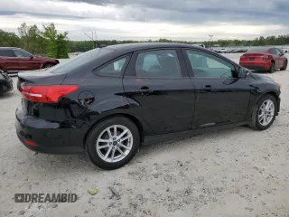2017 Ford Focus SE with VIN 1FADP3F22HL291799, listed as a Copart auction lot 53789195 with 81,646 mi miles and Salvage title. Bid and sale history available at DreamBid. Image 3.