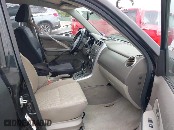 2010 Suzuki Grand Vitara Premium z VIN JS3TE0D22A4101157, wystawiony jako IAAI lot #42231953 z przebiegiem 187 737 mil mil oraz . Historia ofert i sprzedaży dostępna na DreamBid. Obrazek 5.