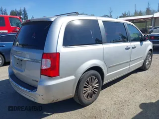2011 Chrysler Town & Country Limited with VIN 2A4RR6DG4BR667311, listed as a IAAI auction lot 42057487 with 93,628 mi miles. Bid and sale history available at carsss.com. Image 4.