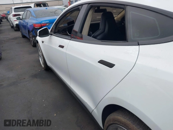 2013 Tesla Model S with VIN 5YJSA1CN1DFP07344, listed as a IAAI auction lot 42746574 with 181,538 mi miles and . Bid and sale history available at DreamBid. Image 14.