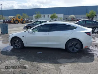 2020 Tesla Model 3 Long Range with VIN 5YJ3E1EB6LF619528, listed as a IAAI auction lot 41937430 with 70,327 mi miles. Bid and sale history available at carsss.com. Image 15.