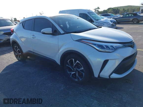 2021 Toyota C-HR LE with VIN NMTKHMBX0MR123981, listed as a IAAI auction lot 41273382 with 51,988 mi miles. Bid and sale history available at carsss.com. Image 1.
