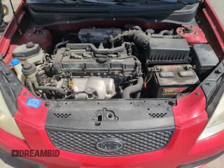 2008 Kia Rio LX with VIN KNADE123986373737, listed as a Copart auction lot 53919515 with 148,743 mi miles and Salvage Title. Bid and sale history available at DreamBid. Image 11.