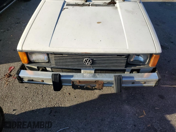 1982 Volkswagen Rabbit z VIN 1VWFB0172CV102467, wystawiony jako Copart lot #84652424 z przebiegiem 86 100 mil mil oraz Szkoda całkowita • Salvage title. Historia ofert i sprzedaży dostępna na DreamBid. Obrazek 11.