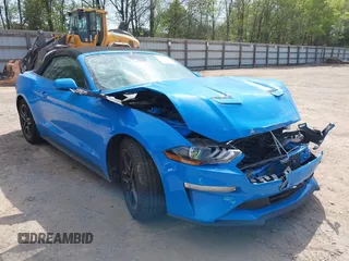 2022 Ford Mustang EcoBoost z VIN 1FATP8UH8N5115470, wystawiony jako IAAI lot #42065747 z przebiegiem 62 335 mil mil oraz . Historia ofert i sprzedaży dostępna na DreamBid. Obrazek 1.