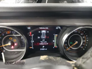 2023 Jeep Wrangler Sport Altitude with VIN 1C4HJXDG6PW635120, listed as a Copart auction lot 77864744 with 31,830 mi miles and Salvage Title. Bid and sale history available at DreamBid. Image 9.