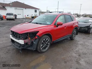 2016 Mazda CX-5 Grand Touring with VIN JM3KE4DYXG0668830, listed as a IAAI auction lot 41738187 with NaN miles. Bid and sale history available at carsss.com. Image 19.
