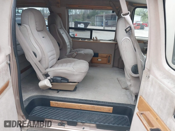 1994 Ford Econoline Cargo with VIN 1FDEE14N3RHB47183, listed as a IAAI auction lot 41953687 with 219,894 mi miles and . Bid and sale history available at carsss.com. Image 8.