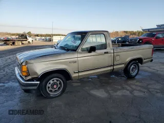 1989 Ford Ranger XL with VIN 1FTCR10AXKUC35082, listed as a Copart auction lot 42209825 with 754,095 mi miles and Salvage title. Bid and sale history available at DreamBid. Image 1.