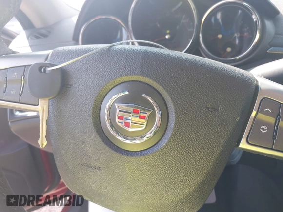 2011 Cadillac CTS with VIN 1G6D25EY3B0133526, listed as a IAAI auction lot 41923952 with 162,785 mi miles and . Bid and sale history available at DreamBid. Image 11.