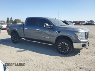 2016 Nissan Titan XD S with VIN 1N6BA1F1XGN515237, listed as a Copart auction lot 74018834 with 64,147 mi miles and Salvage Title. Bid and sale history available at carsss.com. Image 4.