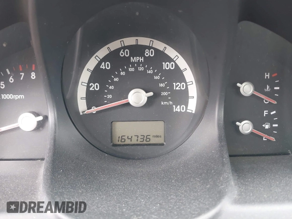2005 Kia Sportage LX with VIN KNDJF723757087655, listed as a IAAI auction lot 41706354 with 164,736 mi miles and . Bid and sale history available at carsss.com. Image 7.