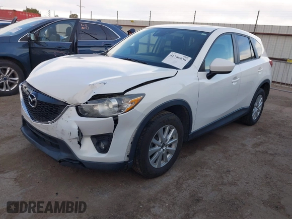 2014 Mazda CX-5 Touring with VIN JM3KE2CY8E0321578, listed as a IAAI auction lot 41769930 with 101,724 mi miles. Bid and sale history available at carsss.com. Image 2.