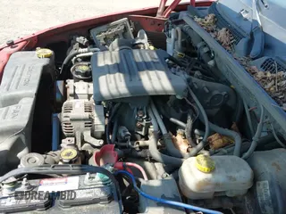 2001 Dodge Dakota Sport с VIN 1B7GL22N61S282029, выставлен на аукционе IAAI как лот 42873290 с пробегом 216 719 миль миль и . История ставок и продаж доступна на DreamBid. Изображение 13.