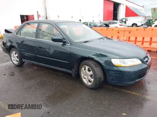 2000 Honda Accord SE z VIN JHMCG5673YC004515, wystawiony jako IAAI lot #41643790 z przebiegiem 140 247 mil mil oraz . Historia ofert i sprzedaży dostępna na DreamBid. Obrazek 1.