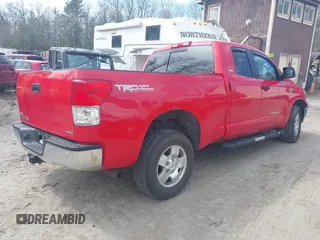 2010 Toyota Tundra 4WD Truck with VIN 5TFUY5F19AX138345, listed as a IAAI auction lot 41929871 with 156,230 mi miles. Bid and sale history available at carsss.com. Image 4.