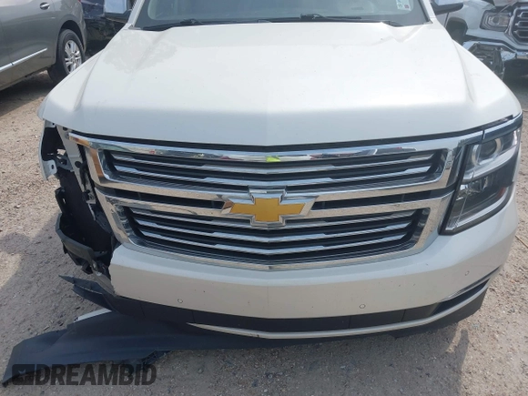 2015 Chevrolet Suburban LTZ with VIN 1GNSCKKC5FR740352, listed as a IAAI auction lot 39075234 with 112,945 mi miles and . Bid and sale history available at DreamBid. Image 13.