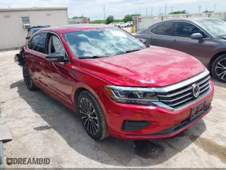 2022 Volkswagen Passat 2.0T Limited Edition with VIN 1VWBA7A30NC010134, listed as a IAAI auction lot 42052451 with 24,923 mi miles. Bid and sale history available at carsss.com. Image 1.