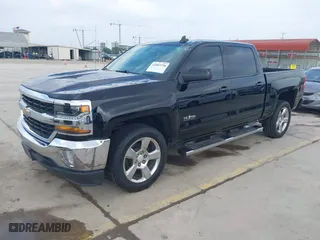 2018 Chevrolet Silverado 1500 LT with VIN 3GCPCREC5JG557884, listed as a IAAI auction lot 41889798 with 112,668 mi miles. Bid and sale history available at carsss.com. Image 2.