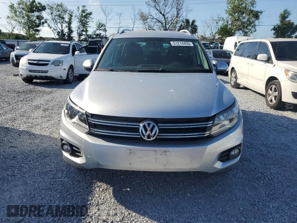2012 Volkswagen Tiguan SE with VIN WVGAV7AX9CW607599, listed as a Copart auction lot 51214455 with 131,109 mi miles and Salvage Title. Bid and sale history available at DreamBid. Image 5.