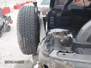 2023 Jeep Wrangler Willys with VIN 1C4HJXDN1PW596046, listed as a IAAI auction lot 41580875 with 48,451 mi miles and . Bid and sale history available at DreamBid. Image 6.