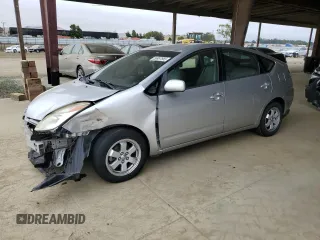 2005 Toyota Prius z VIN JTDKB20U557029770, wystawiony jako Copart lot #59997865 z przebiegiem 237 030 mil mil oraz Szkoda całkowita • Salvage title. Historia ofert i sprzedaży dostępna na DreamBid. Obrazek 1.