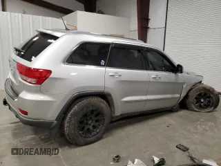 2011 Jeep Grand Cherokee Laredo z VIN 1J4RR4GGXBC609891, wystawiony jako Copart lot #52089645 z przebiegiem 180 895 mil mil oraz Szkoda całkowita • Salvage title. Historia ofert i sprzedaży dostępna na DreamBid. Obrazek 3.