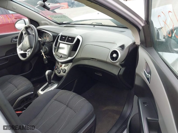 2017 Chevrolet Sonic LT with VIN 1G1JD5SG2H4133131, listed as a IAAI auction lot 41804387 with 113,748 mi miles. Bid and sale history available at carsss.com. Image 5.