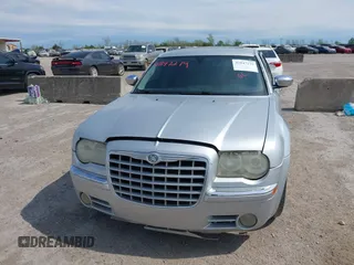 2005 Chrysler 300 with VIN 2C3JA63H05H693522, listed as a IAAI auction lot 41847279 with 162,037 mi miles. Bid and sale history available at carsss.com. Image 12.