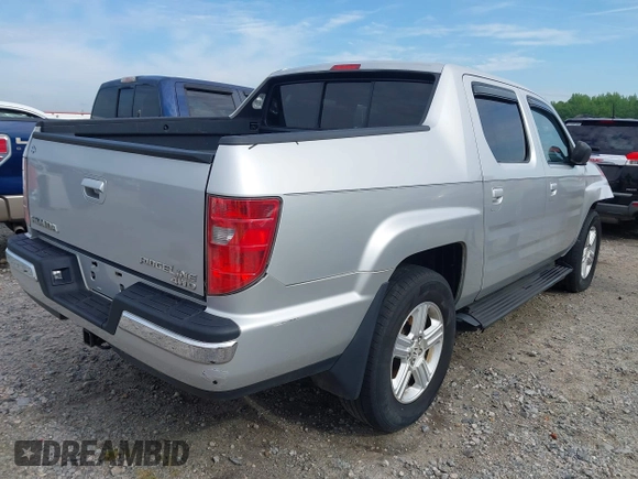 2009 Honda Ridgeline RTL with VIN 2HJYK16539H500986, listed as a IAAI auction lot 42084176 with 161,142 mi miles and . Bid and sale history available at DreamBid. Image 4.